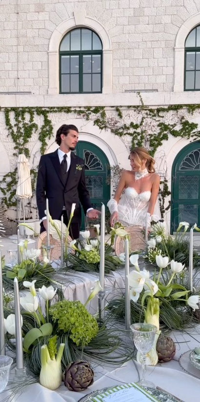 Couple in stone courtyard