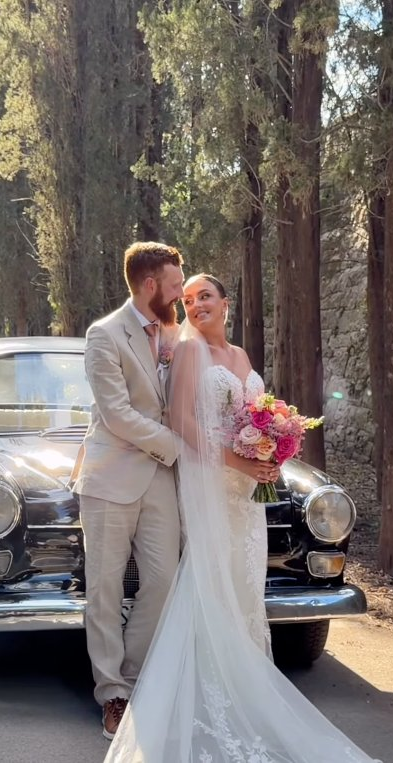 Couple by vintage car